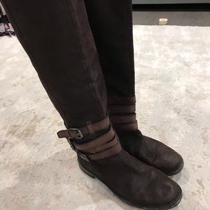 Tall brown leather boots